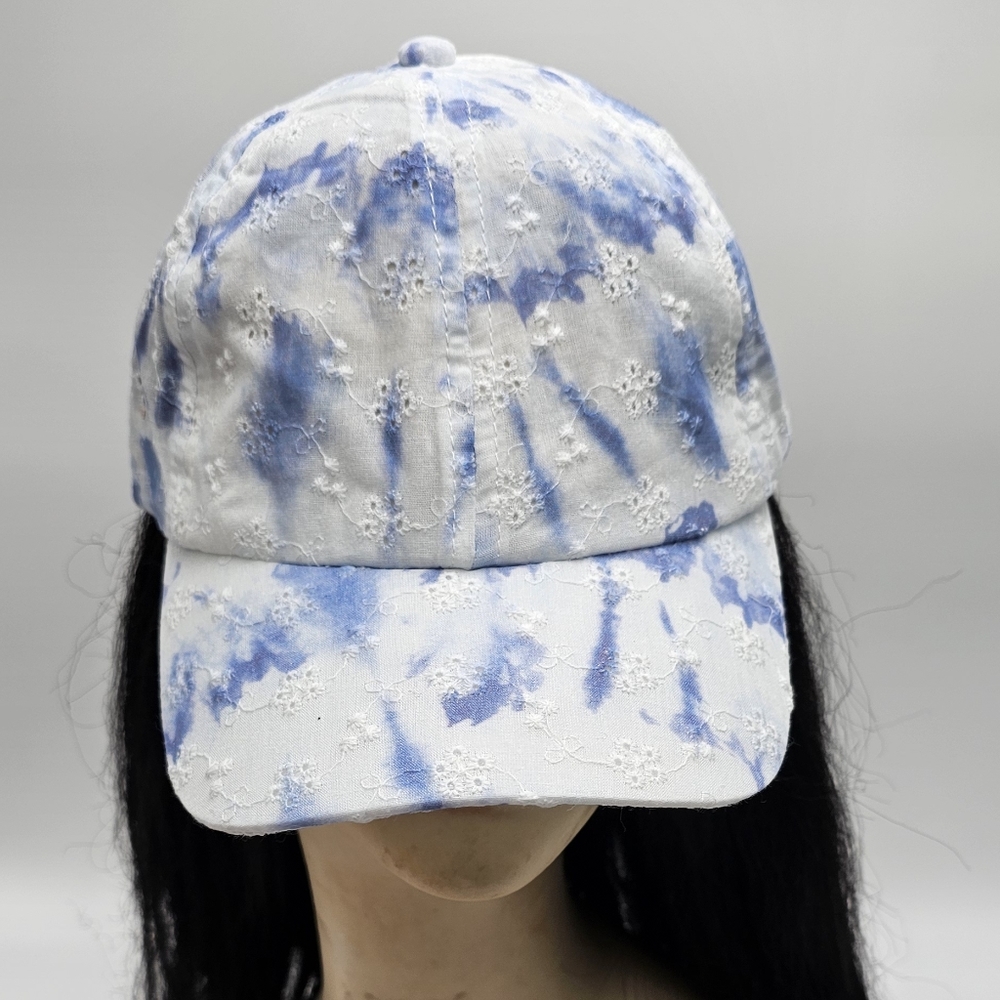 100% cotton blue and white cap. Adjustable back strap.